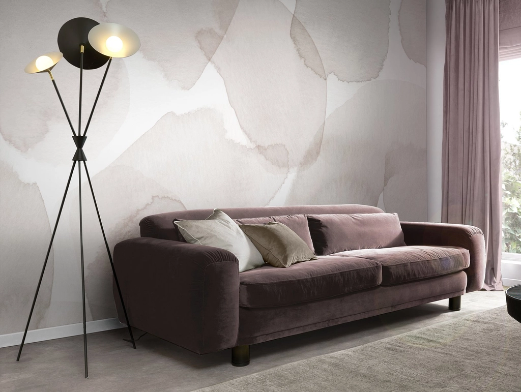 Soft watercolor wallpaper installed behind a sofa